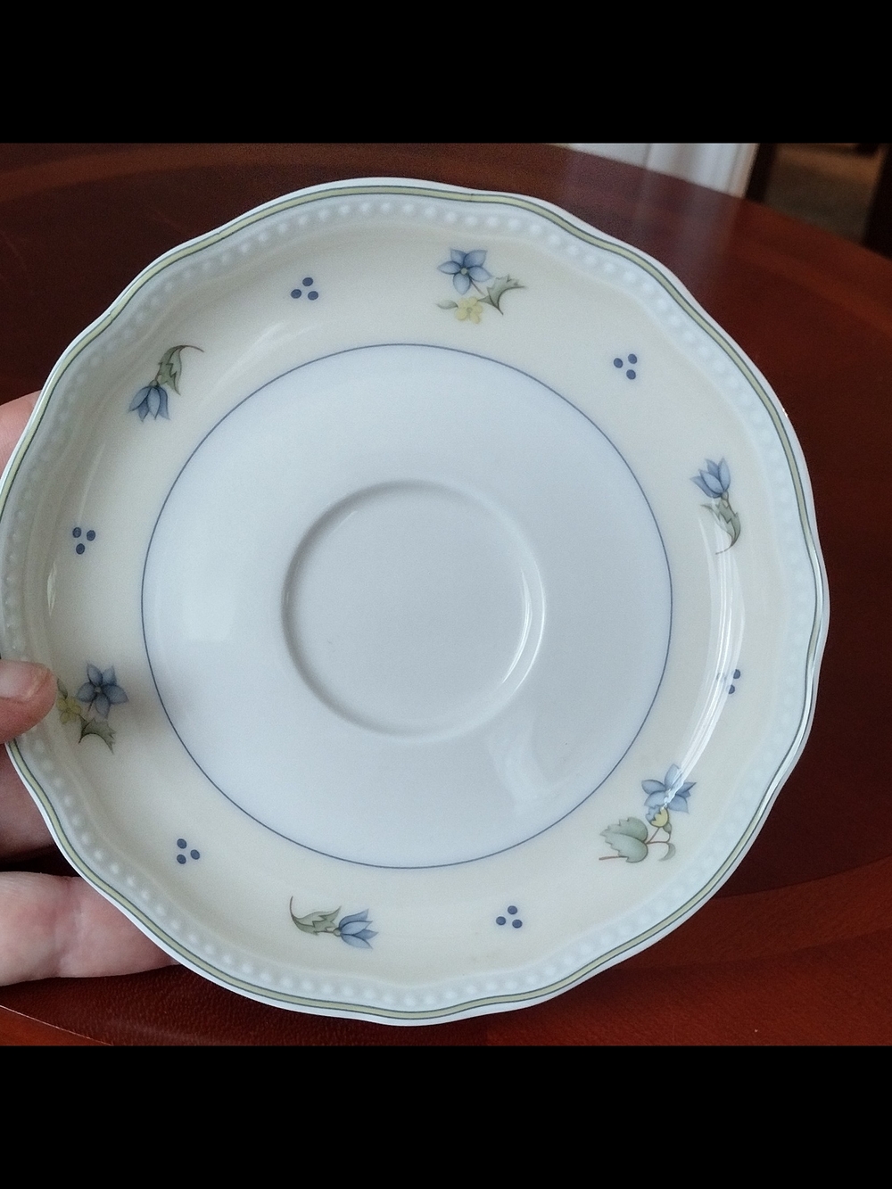 Porcelain Saucer with Blue Floral Accent